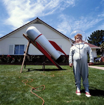 Jonny Fusion: Boy inventor. Johnny Fusion, aged 10, poses before his home-made rocket-ship. The extension core apparently is for charging the ship's batteries, while propulsion is handled by a mixture of Coke and Mentos. Amazingly enough, the ship did reach orbit on its maiden flight.Johnny has promised a bigger and better rocketship for his next attempt.